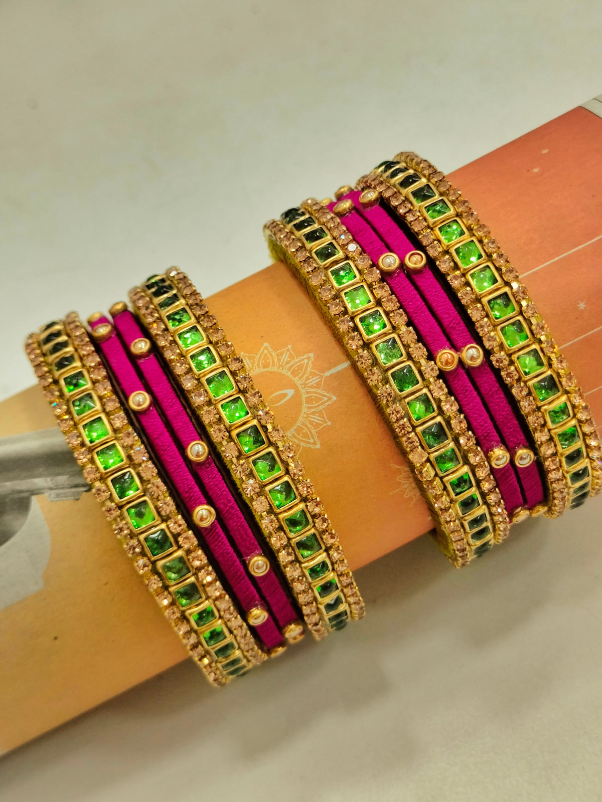 Minimal red and gold bangle design